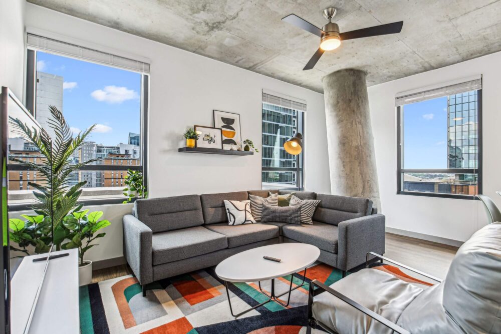 Interior of living room with view of windows.